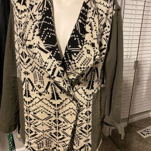 Pretty jacket with an unusual flair. Never worn